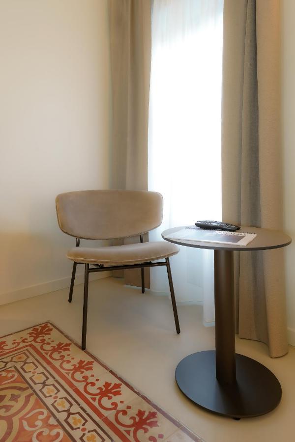 Bergamo Inn 21 Exteriér fotografie A chair